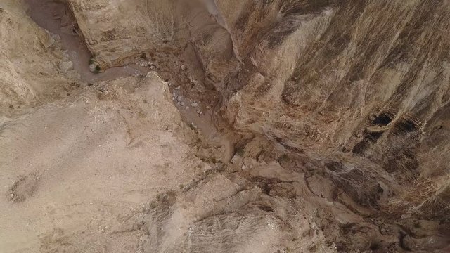 Aerial view of Flash flood after rain in dry desert riverbed