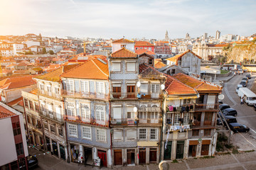 CItyscape view with beautiful old buildings during the sunset light in Porto city, Portugal - obrazy, fototapety, plakaty