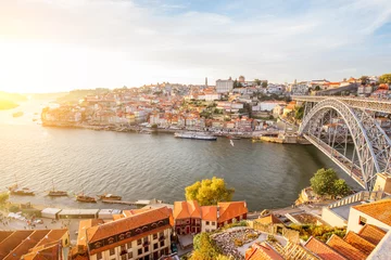 Tafelkleed Panoramic landscape view on the old town with Douro river and famous iron bridge in Porto city during the sunset in Portugal © rh2010