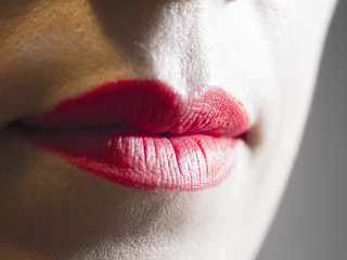 Lips makeup in red of woman