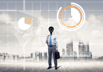 Obraz premium Camera headed man standing on wooden floor against modern citysc