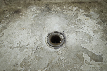 dilapidated bathtub hole