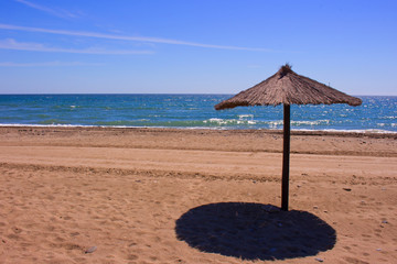 Sun umbrella. Sunny day. Costa del Sol, Andalusia, Spain.