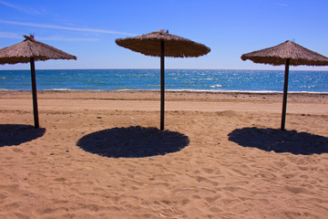 Sun umbrella. Sunny day. Costa del Sol, Andalusia, Spain.