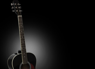Obraz na płótnie Canvas Acoustic guitar isolated on a black background