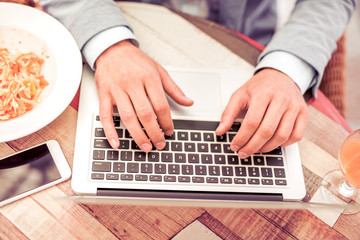 Businessman hand working with digital tablet computer and smart phone.