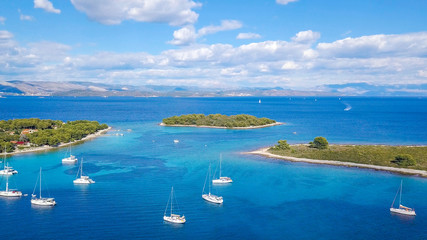 Aerial view of cozy mediterranean island. Blue lagoon, island paradise. Adriatic Sea of Croatia,...