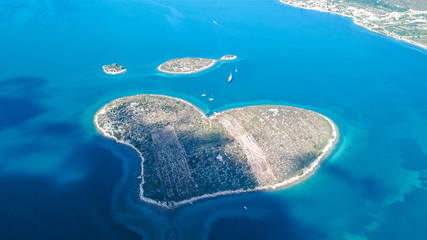 Aerial view of beautiful heart-shaped Island of Galesnjak, also called Island of Love, in Pasman...