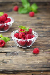 Fresh sweet raspberry on the wooden table