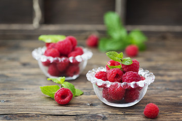 Fresh sweet raspberry on the wooden table