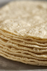 A stack of fresh corn tortillas