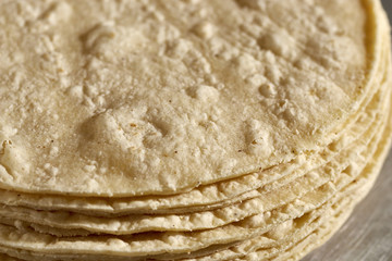 A stack of fresh corn tortillas