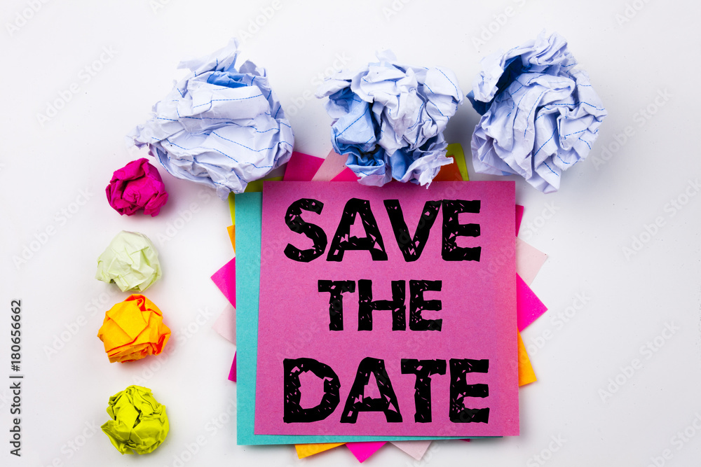 Poster writing text showing save the date written on sticky note in office with screw paper balls. business