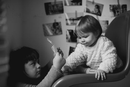 sisters and old memories on the wall