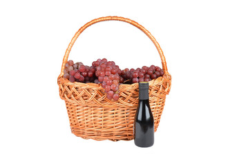 Fototapeta na wymiar Red grape and wine bottle