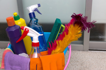 Home cleaning concept Basket with house cleaning product