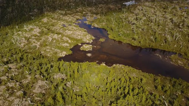 Flying over mountain lake