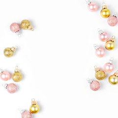 Stylish  arrangement, frame of bright christmas balls on white background. Flat lay, top view