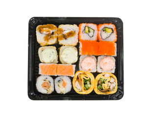 assorti sushi set in open plastic box isolated on white background