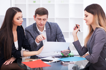 Business and office concept - happy business team in office