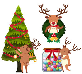 Obraz na płótnie Canvas Reindeer decorating christmas tree