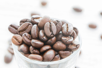 Top view of coffee beans with glass shot.
