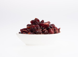 dried cranberries or dried fruits on a background.
