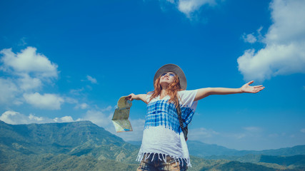 Asian women travel relax in the holiday. View map explore the route. Thailand