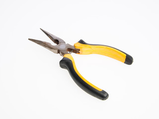 Obraz premium Pliers or Needle nose pliers on a background.