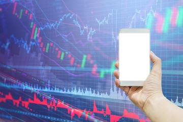 business connection concept with hand use smartphone with background of stock market chart analysis