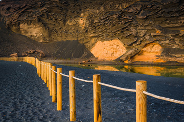 Rocks at sunset in the Gulf of El Golfo. Lanzarote. Canary Islands. Spain