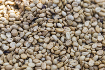 Closeup dry coffee beans background