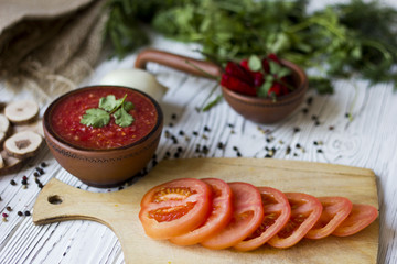 vegetarian dishes and vegetables - tomato, chilli and fresh herbs - dill parsley Basil