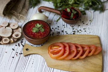 vegetarian dishes and vegetables - tomato, chilli and fresh herbs - dill parsley Basil