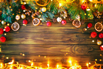 Christmas winter background, a table decorated with fir branches and decorations. Happy New Year. Merry Christmas.