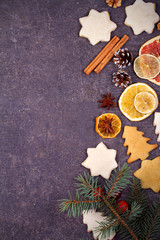 Christmas and New Year border or frame on grunge wooden background. Winter holidays concept. View from above, top studio shot, horizontal