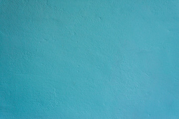 texture of a painted turquoise concrete wall
