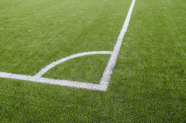 Obraz premium The Corner of the artificial grass soccer field.