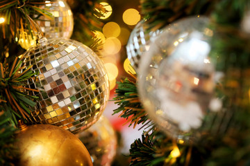 joy to decorative with mirror ball or Christmas ball to decorative for Christmas festival with bokeh background. Have some space for write wording