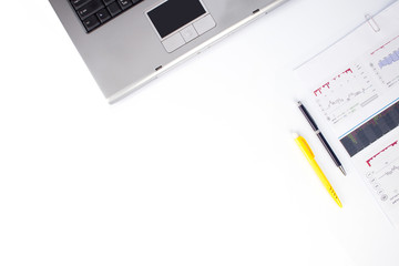 notebook and Stock graph with pen on white background, Top view with copy space