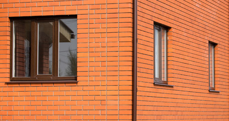 window in a red brick house