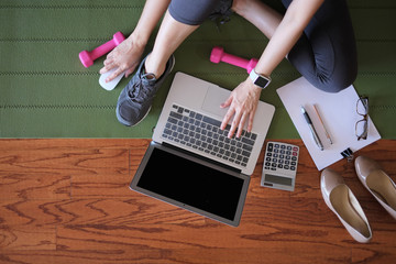 woman work and workout at home for healthy concept and work life