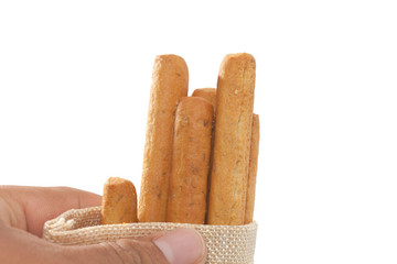 hand holding bread stick