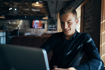 cafe, man in black shirt, laptop