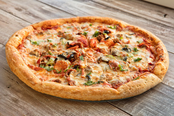Pizza On A Wooden Table