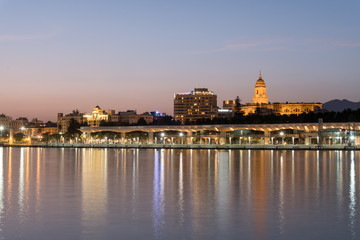Obraz premium Sunset Cityscape In The Marina Bay Port Of Malaga