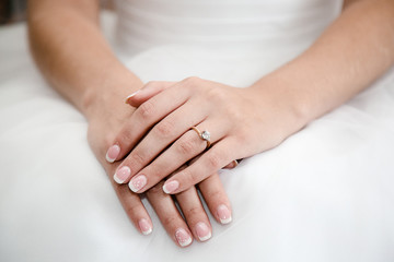 Hands of bride with ring