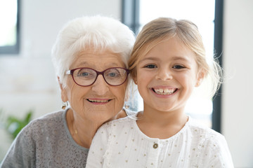 Portrait of grandmother with granddaughter