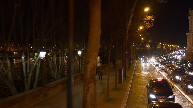 night time illumination paris double-decker bus ride traffic street riverside panorama 4k france
