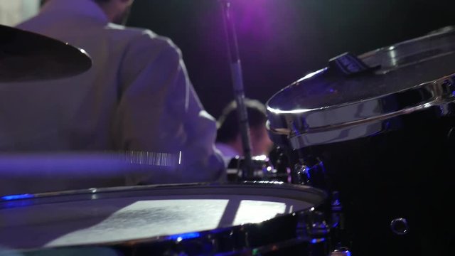 close-up musician playing drum plate on jazz festival. Slow motion